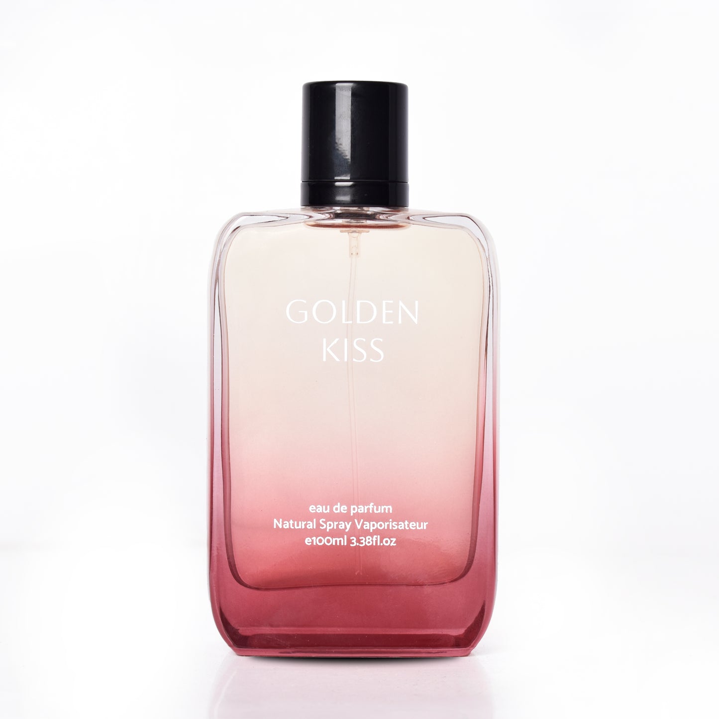 Perfume bottle labeled Golden Kiss on a white background